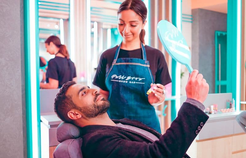Brow Artist showing customer their look